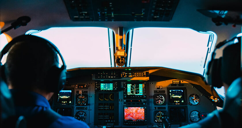pilots at work in the cockpit